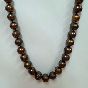 18” strand of freshwater chocolate color pearls.
